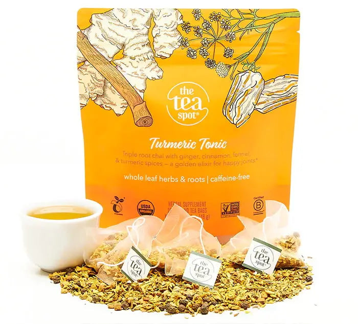 Turmeric Tonic tea with sachets in front. 